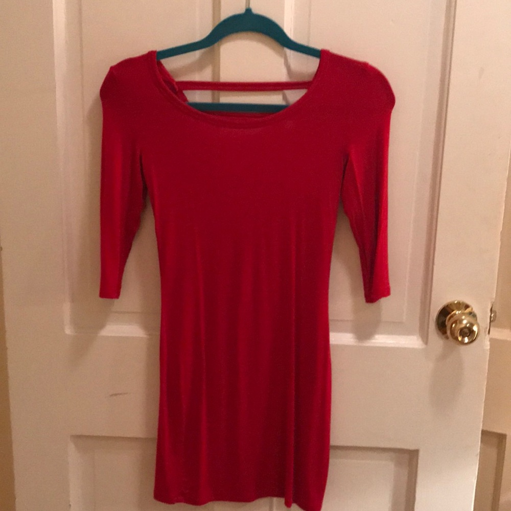 Tobi body con dress with cut outs in the back